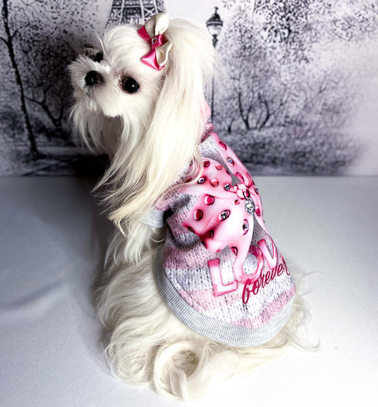 Felpa Carina rosa con stampa effetto maglia, fiocco decorativo e cristalli Swarovski, colletto in pelliccia rosa.