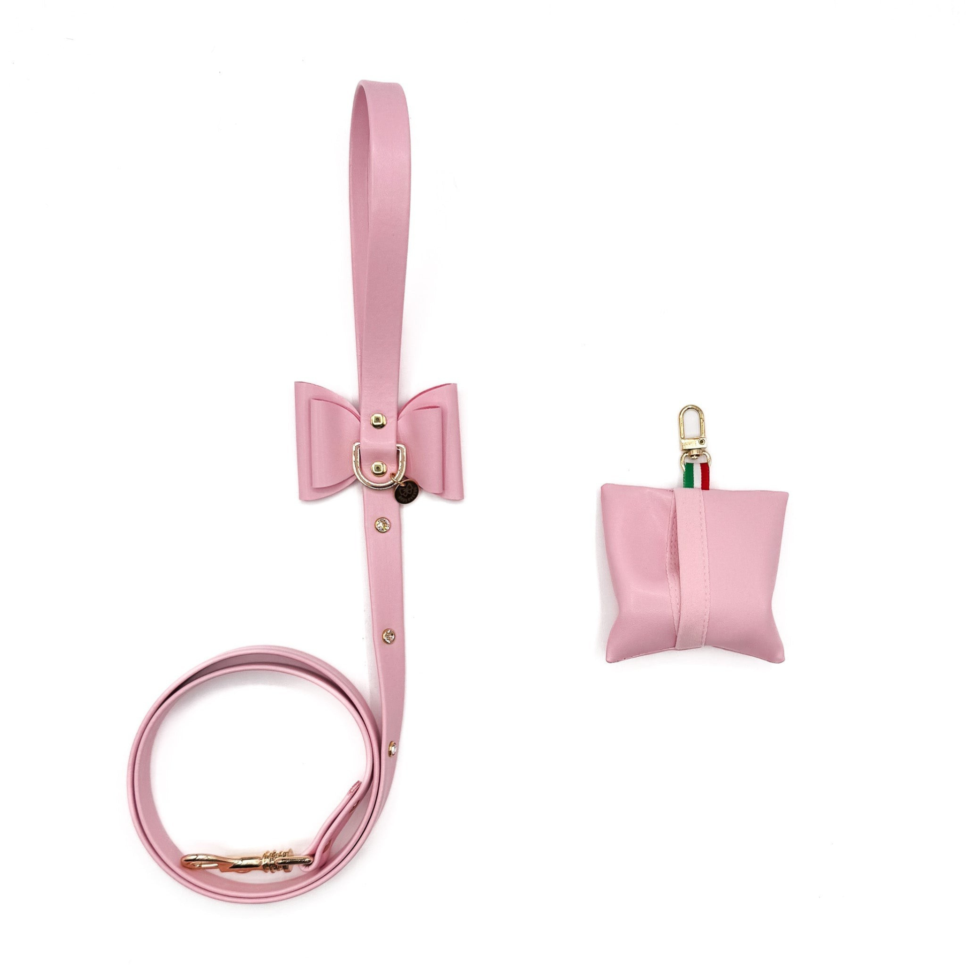 Guinzaglio in ecopelle rosa con cristalli e portasacchetti abbinato