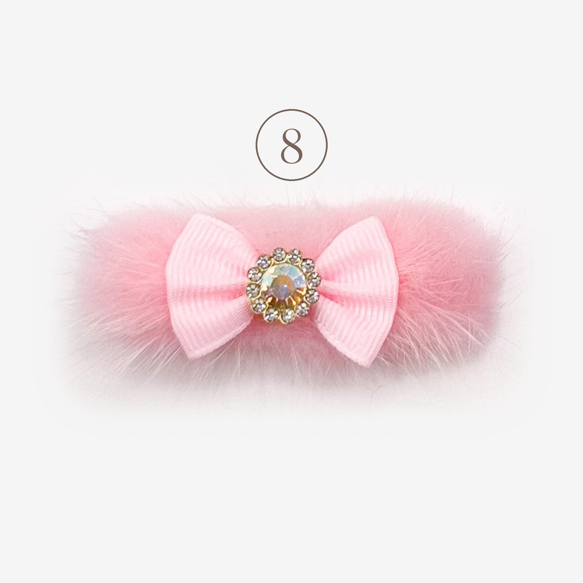 Barretta Fluffy 8, pelliccetta rosa con fiocchetto in gros-grain rosa e cristallo