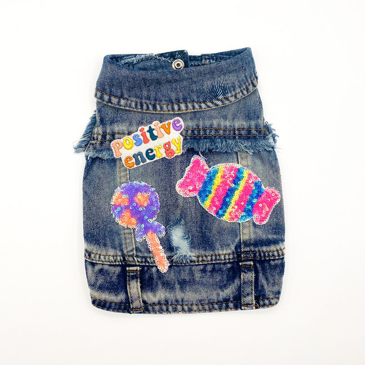 BauJeans Lollipop, gilet in denim con caramella e lecca-lecca di paillettes e la scritta positive energy