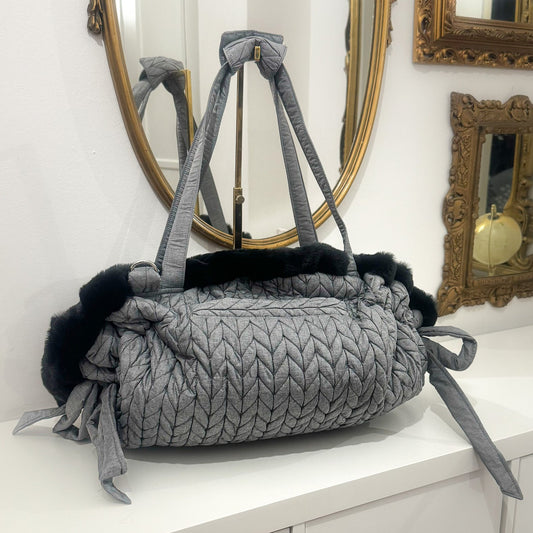 Borsa Nanna Bag Trecce in microfibra grigia con trapuntatura a trecce, manici e nastri a fiocco