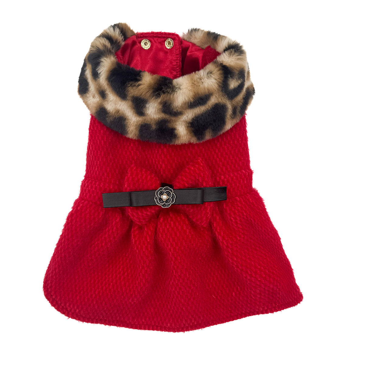 Cappottino Ruby steso visto dal dorso, con collo leopardato, fiocco in ecopelle con bottone gioiello e gonna arricciata