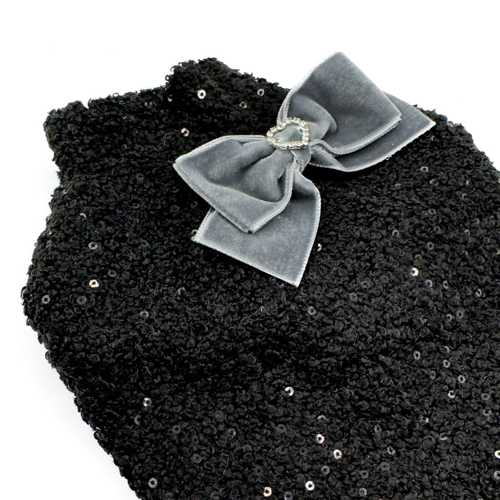 Dettaglio del fiocco in velluto grigio e delle paillettes del Maglioncino Melissa nero