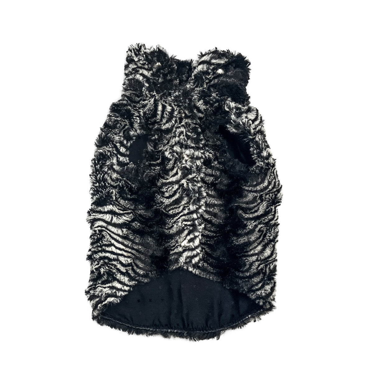 Cappottino Volpetta in eco pelliccia rasata bianca e nera, visto da dietro